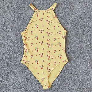 yellow bodysuit